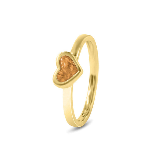 Asring met een hartje er boven op , waar zichtbaar as of haar in verwerkt wordt. Gold