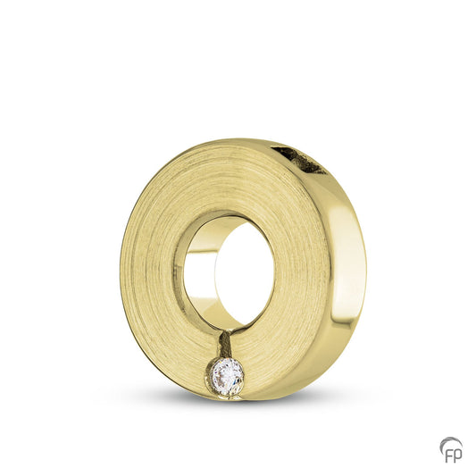 Ronde hanger, in zilver uitgevoerd met een zirkonia, in goud met een diamant. De ashangers uit deze collectie gedenksieraden zijn eenvoudig zelf te vullen