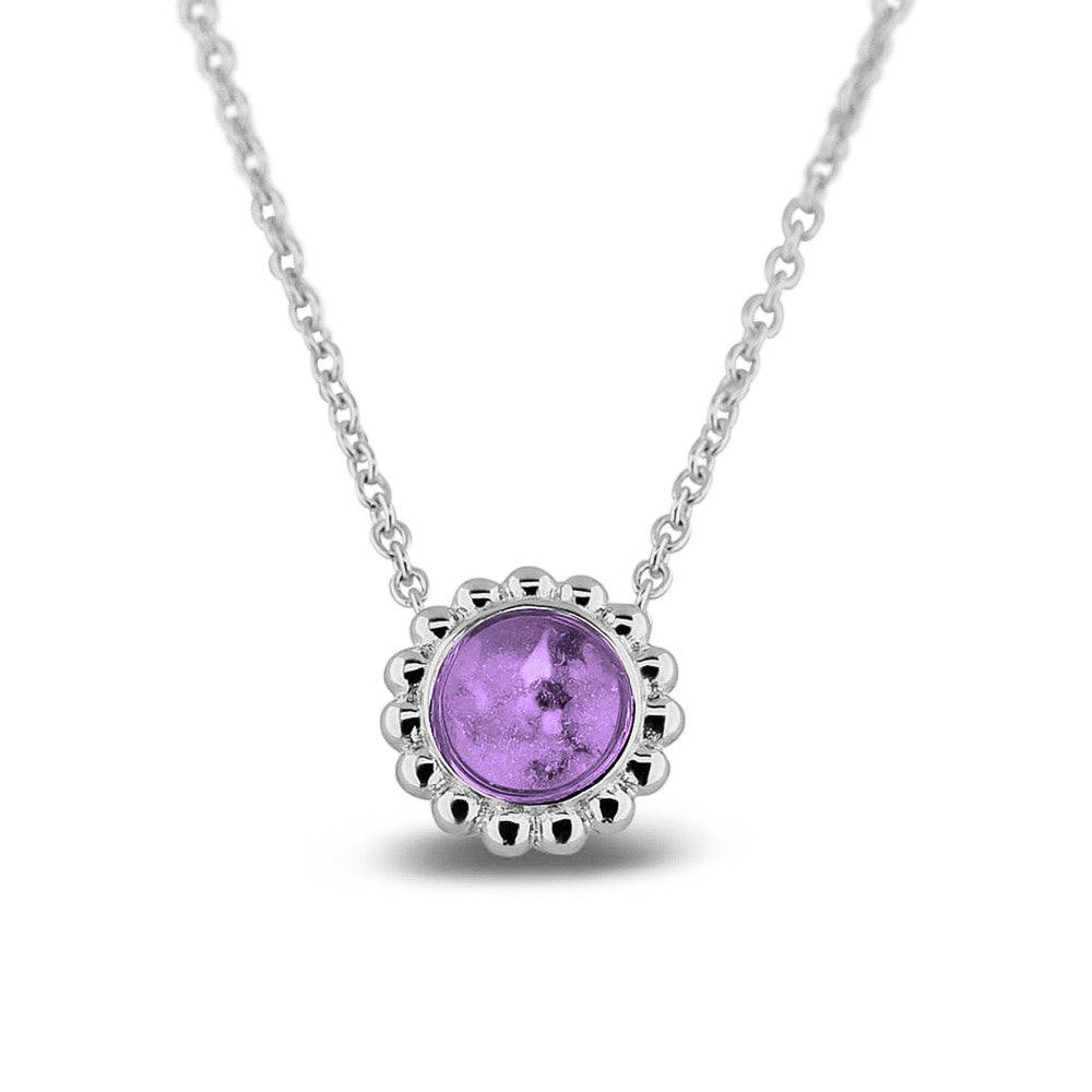 Ashanger, gedenksieraad, waar as en haar in verwerkt wordt. Purple