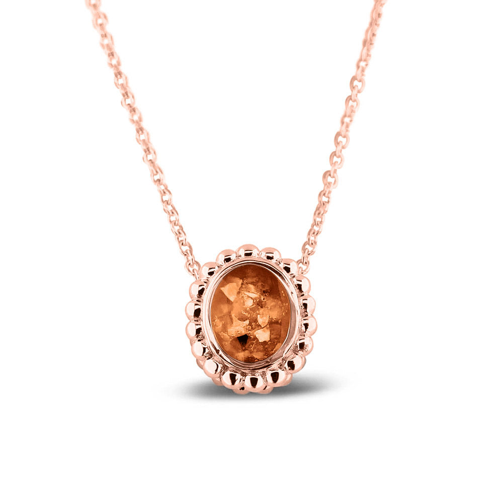 Ashanger, gedenksieraad, waar as en haar in verwerkt wordt.orange