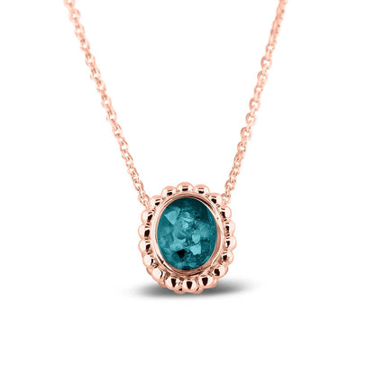 Ashanger, gedenksieraad, waar as en haar in verwerkt wordt.turquoise