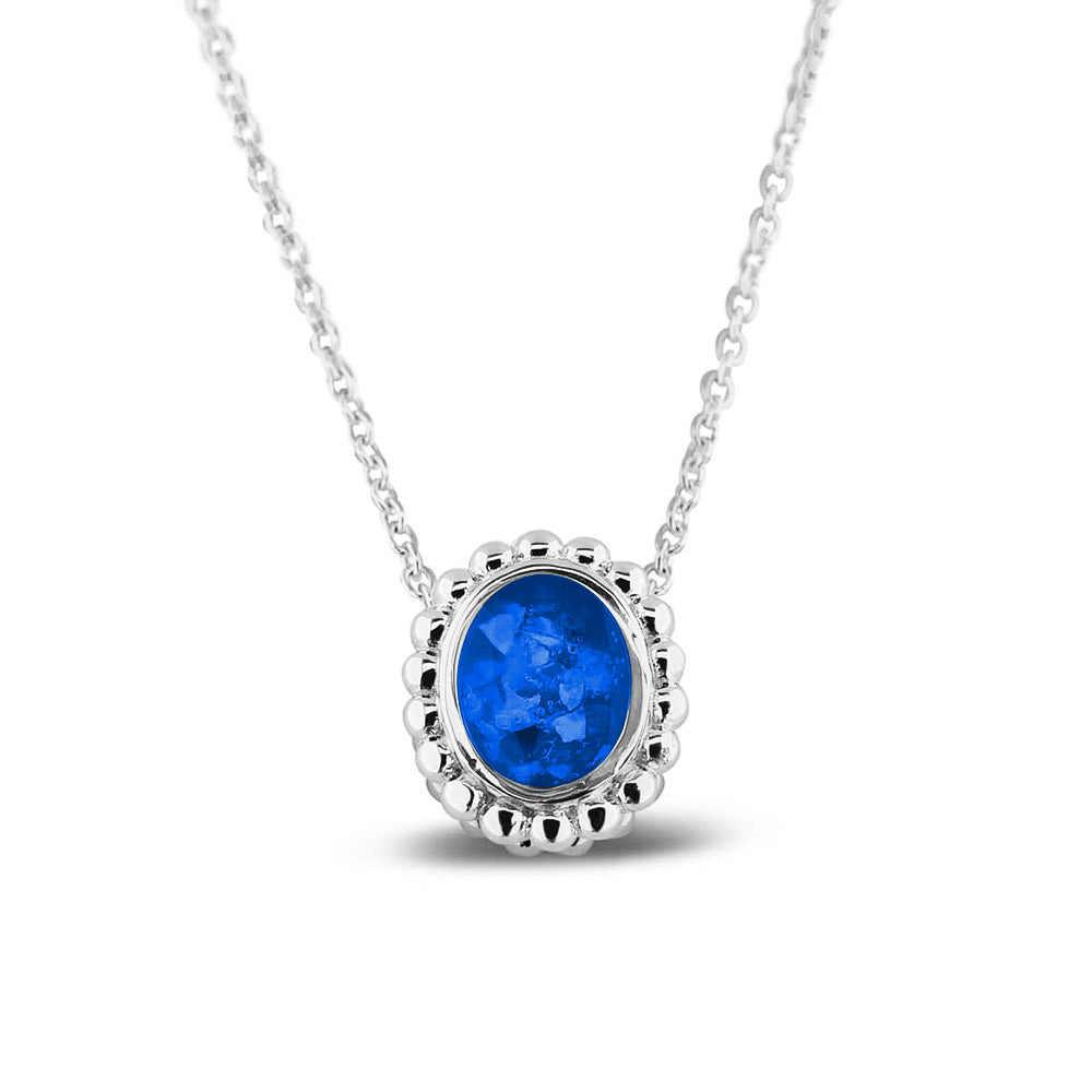 Ashanger, gedenksieraad, waar as en haar in verwerkt wordt.blue