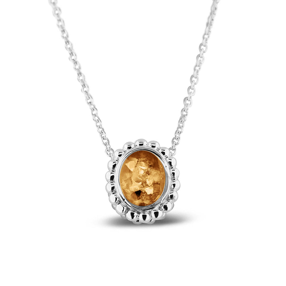 Ashanger, gedenksieraad, waar as en haar in verwerkt wordt.gold