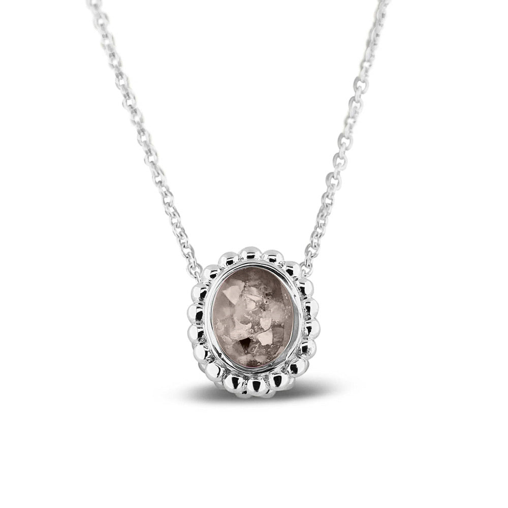 Ashanger, gedenksieraad, waar as en haar in verwerkt wordt.silver