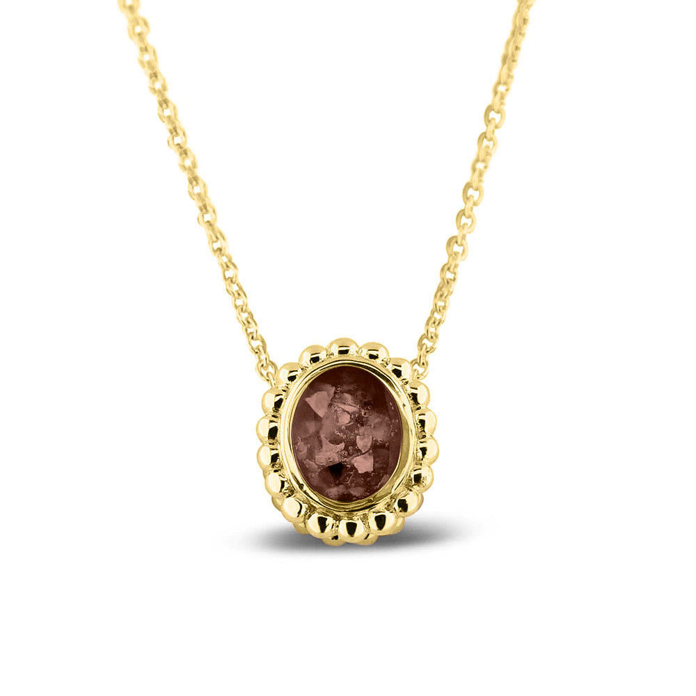 Ashanger, gedenksieraad, waar as en haar in verwerkt wordt.brown