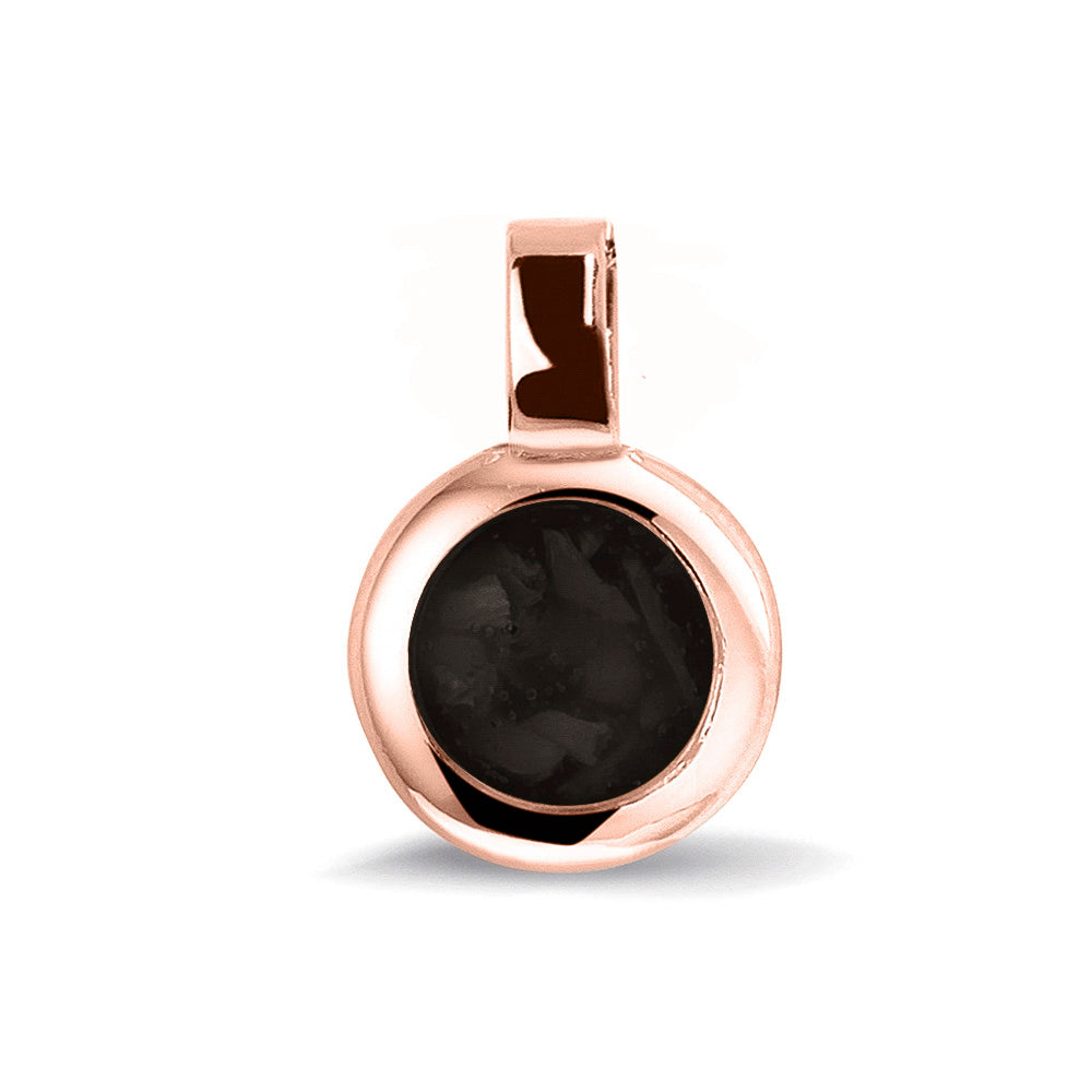Ronde ashanger, gedenksieraad, waar as en haar in verwerkt wordt.black