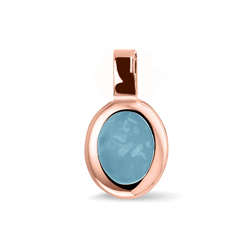 Ovale platte ashanger, gedenksieraad, waar as en haar in verwerkt wordt. Baby