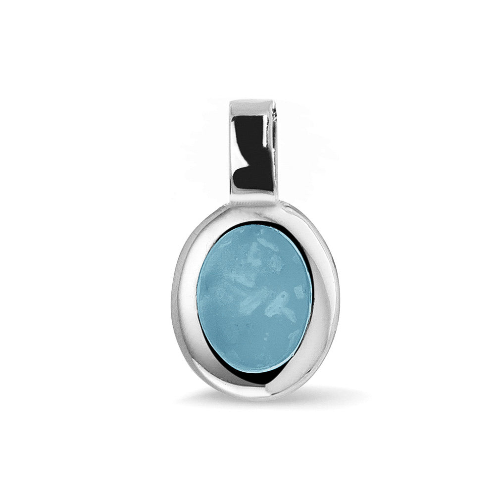 Ovale platte ashanger, gedenksieraad, waar as en haar in verwerkt wordt. Baby