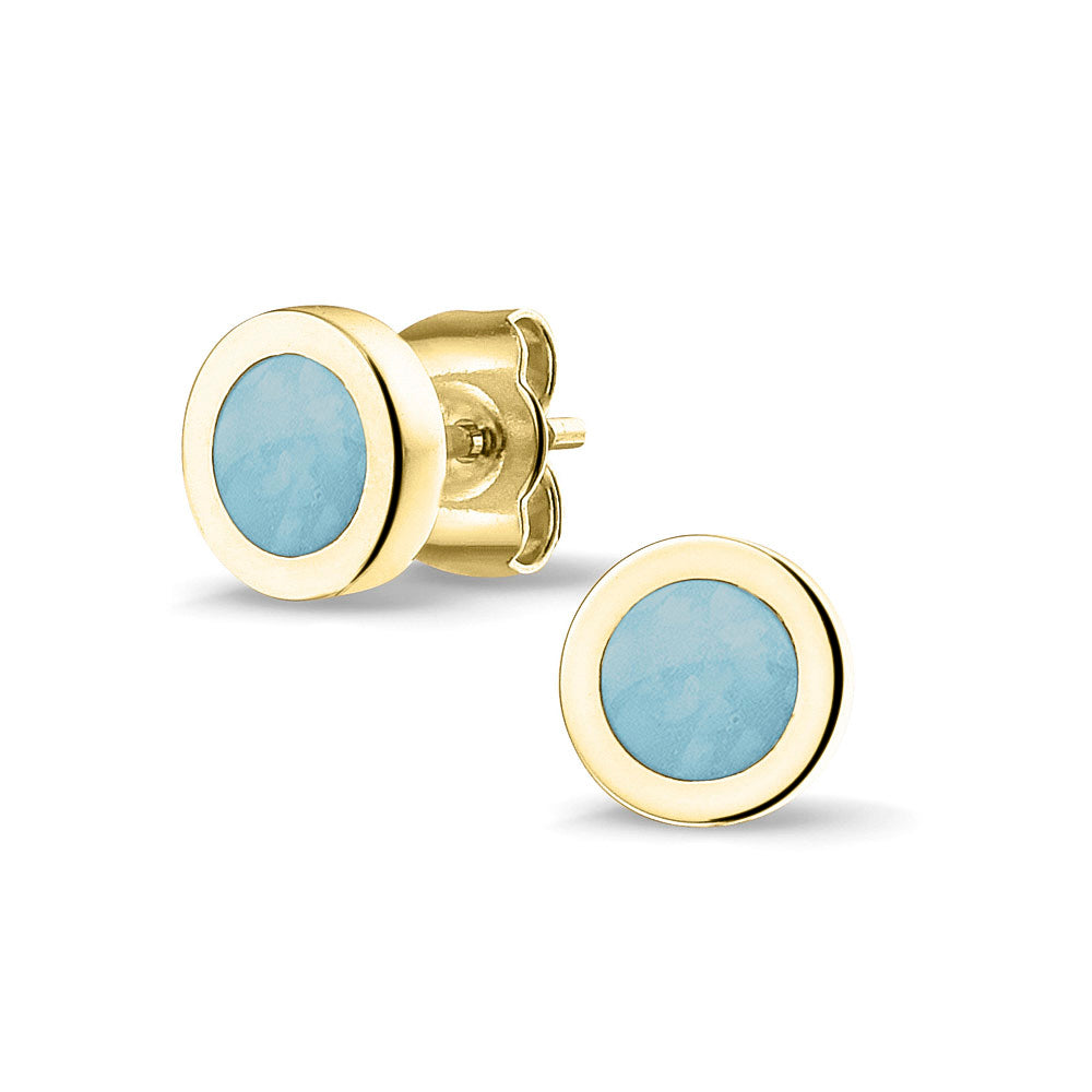 Rond gevormde oorstekers 8 mm aan de voorzijde zichtbaar gevuld met as of haar. Baby