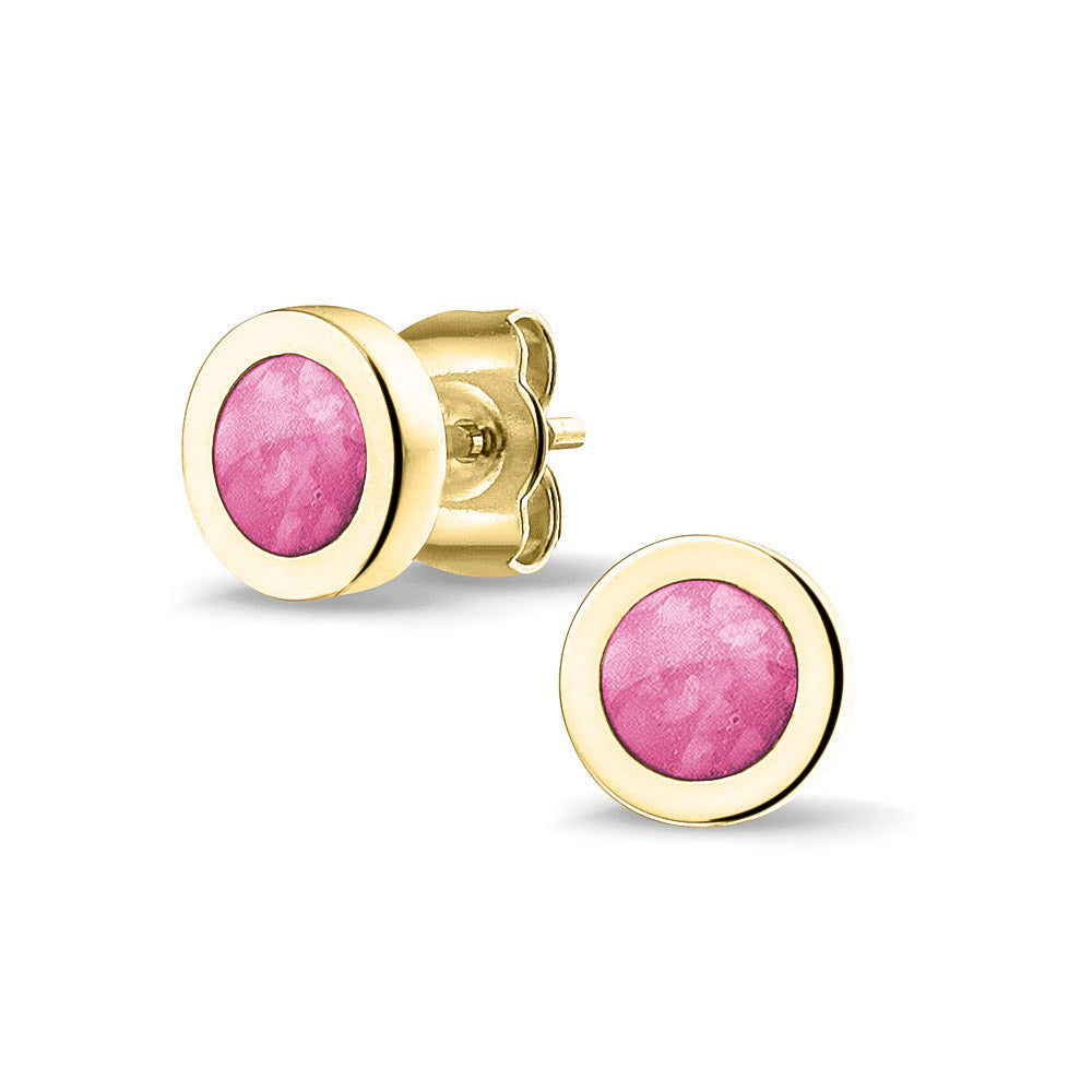 Rond gevormde oorstekers 8 mm aan de voorzijde zichtbaar gevuld met as of haar. Fluo