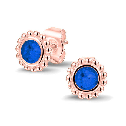 Twee stuks ronde oorstekers 8 mm zichtbaar gevuld met as of haar. Blue