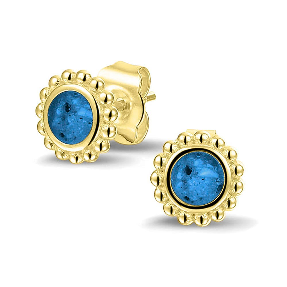 Twee stuks ronde oorstekers 8 mm zichtbaar gevuld met as of haar. Marine