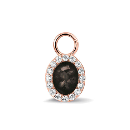 Ovaal gevormde oorhangers, 18 mm lang rondom afgewerkt met zirkonia's, aan de voorzijde zichtbaar gevuld met as of haar. black.