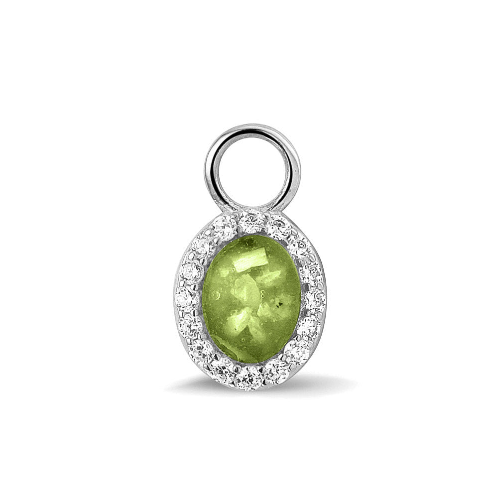 Ovaal gevormde oorhangers, 18 mm lang rondom afgewerkt met zirkonia's, aan de voorzijde zichtbaar gevuld met as of haar. Green