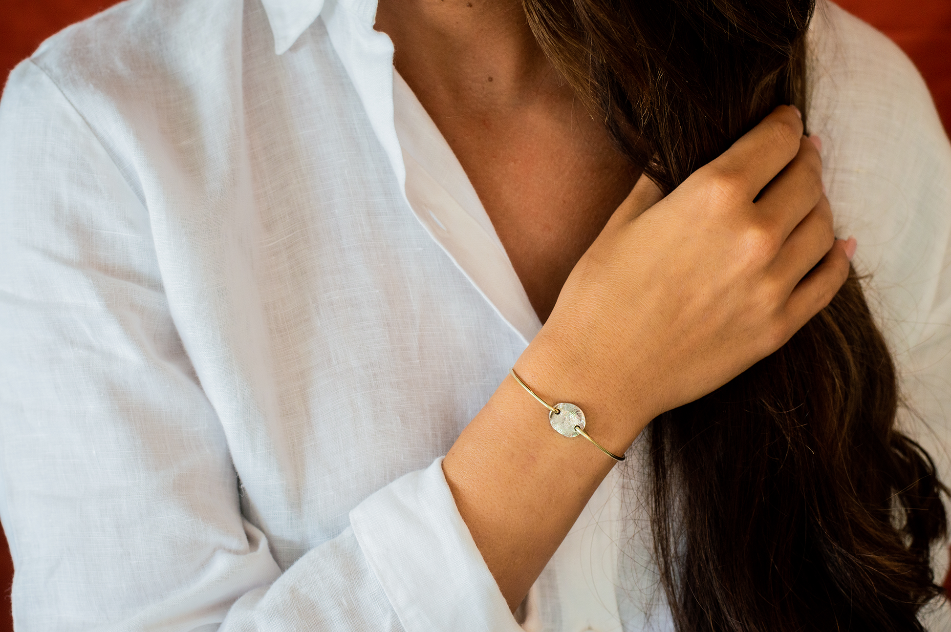 Roségouden armband met zilveren 925 sterling muntje en vingerafdruk.alle