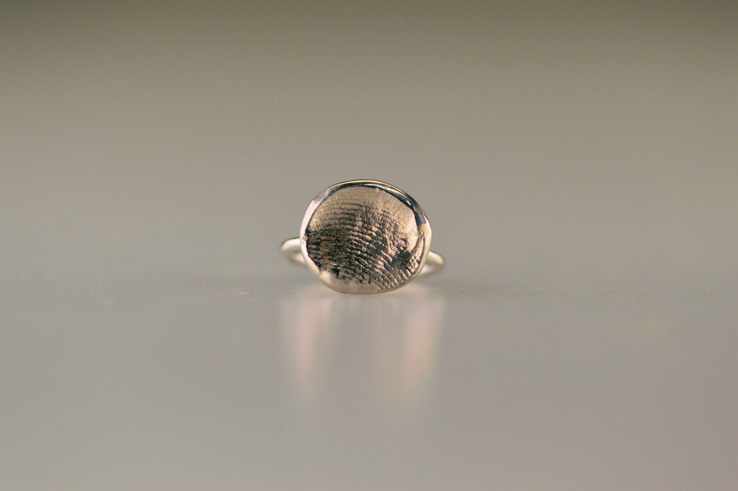 Ring met vingerafdruk