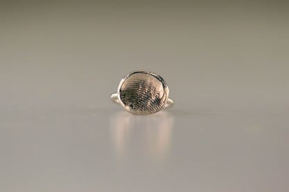 Ring met vingerafdruk