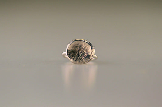 Ring met vingerafdruk