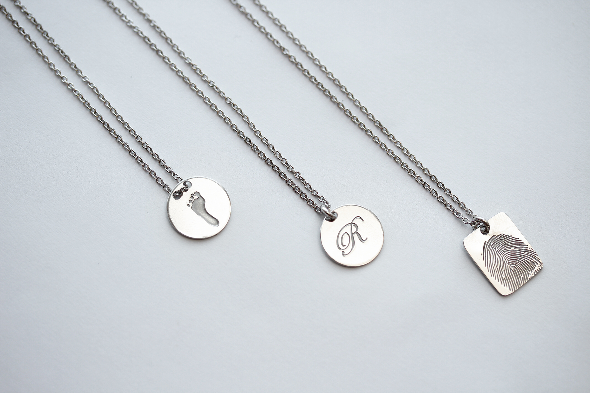 Hanger voorzien van een vingerafdruk uit collectie gedenksieraden,alle