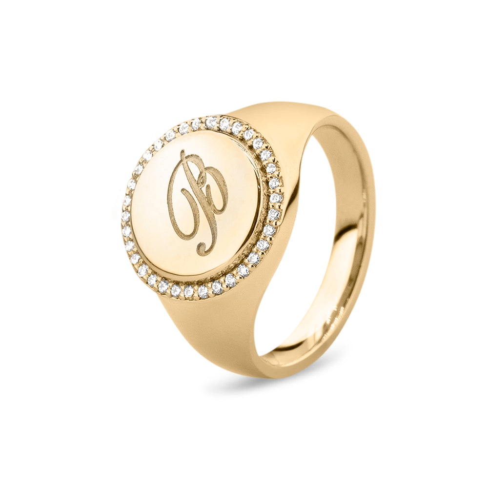  Zegelring geelgoud voorzien van een gravure, rondom afgewerkt met zirkonia's. geelgoud