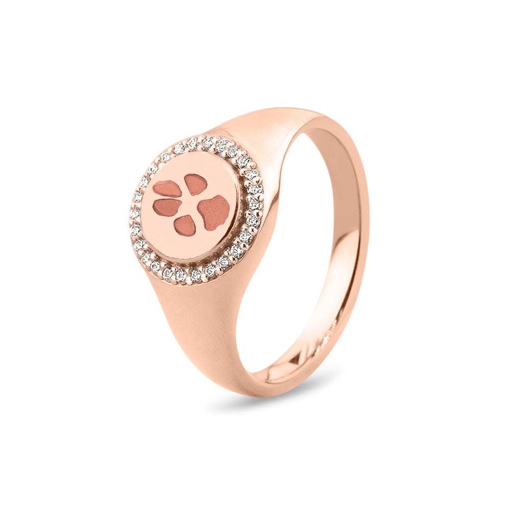 Zegelring roségoud voorzien van een gravure, rondom afgewerkt met zirkonia's. roségoud
