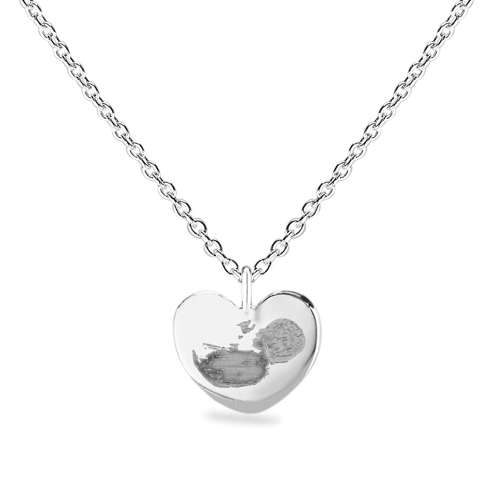 Hanger witgoud hart voorzien van een gravure uit collectie gedenksieraden. Witgoud