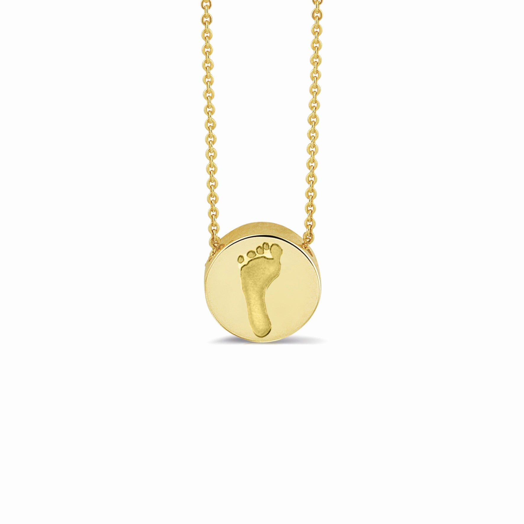 Ashanger rond, gedenksieraad, waar as en haar in verwerkt wordt. Geelgoud