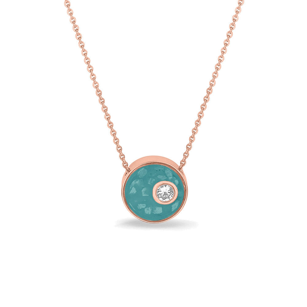 Ashanger rond, gedenksieraad, waar as en haar in verwerkt wordt. Aqua