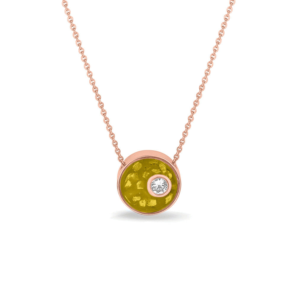 Ashanger rond, gedenksieraad, waar as en haar in verwerkt wordt. Yellow