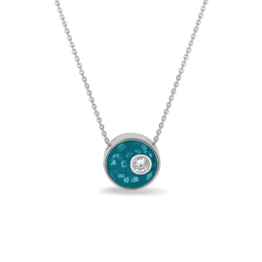 Ashanger rond, gedenksieraad, waar as en haar in verwerkt wordt. Turquoise