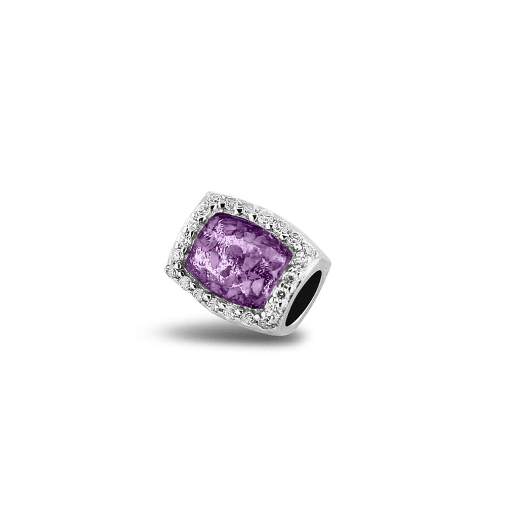 Asbedel rondom afgewerkt met zirkonia's die aan beide zijdes in twee compartimenten zichtbaar gevuld wordt met as of haar. Purple