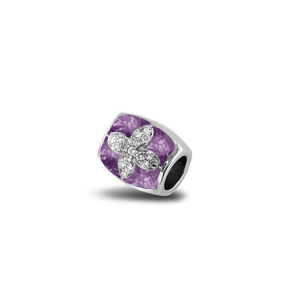 Asbedel met  zirkonia's, aan beide zijdes in twee compartimenten zichtbaar gevuld met as of haar. Purple