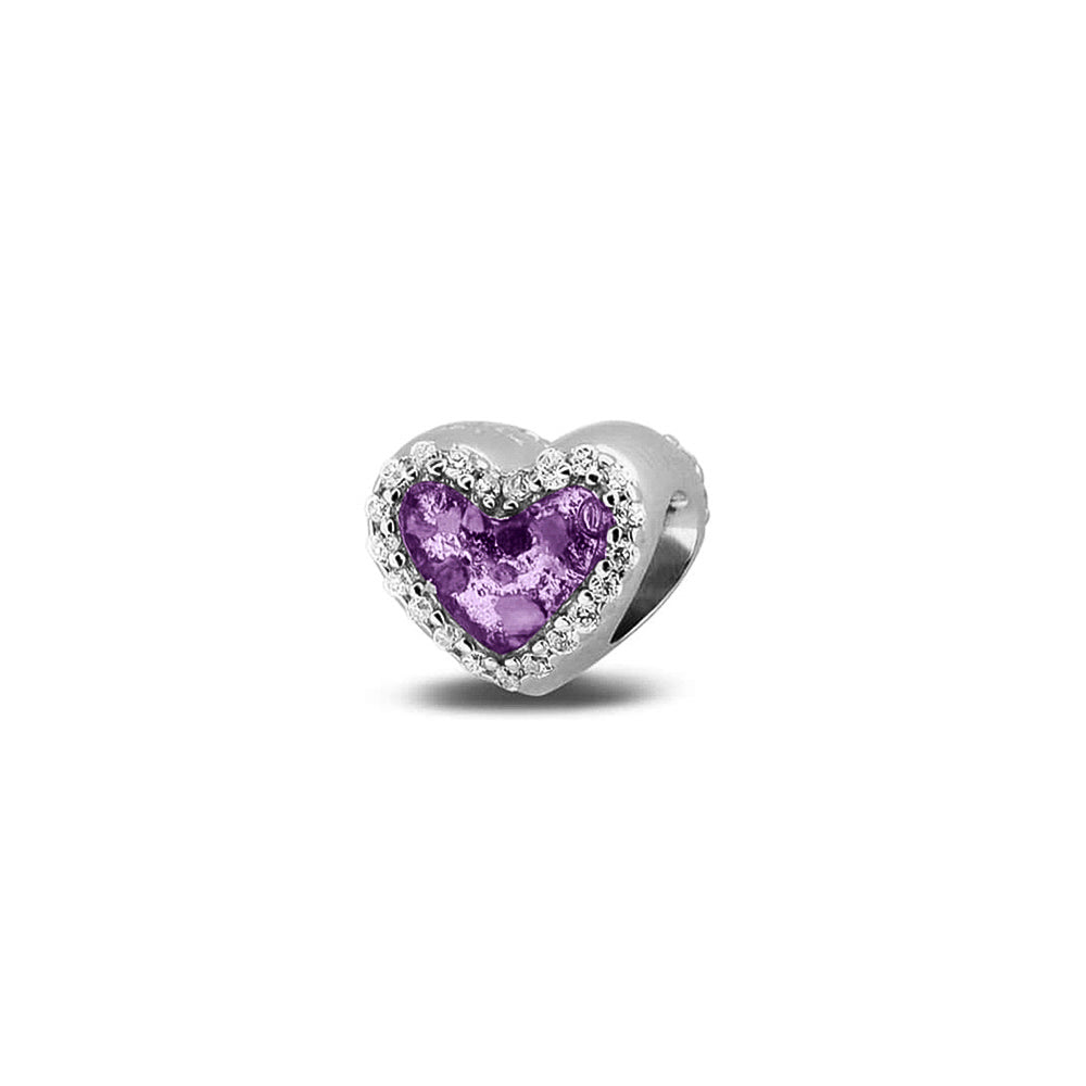 Hartvormige asbedel met  zirkonia's rondom afgewerkt, die aan beide zijdes in twee compartimenten zichtbaar gevuld wordt met as of haar met een keuze in 20 kleuren. Purple