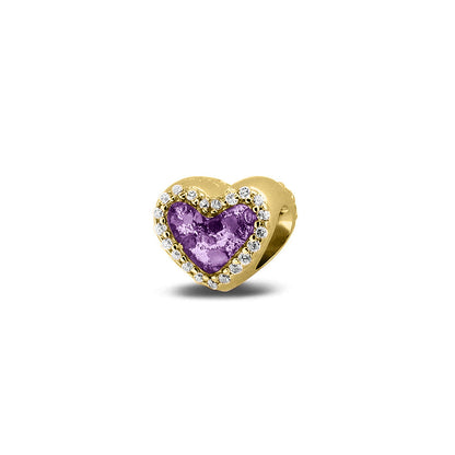 Hartvormige asbedel met  zirkonia's rondom afgewerkt, die aan beide zijdes in twee compartimenten zichtbaar gevuld wordt met as of haar met een keuze in 20 kleuren. Purple