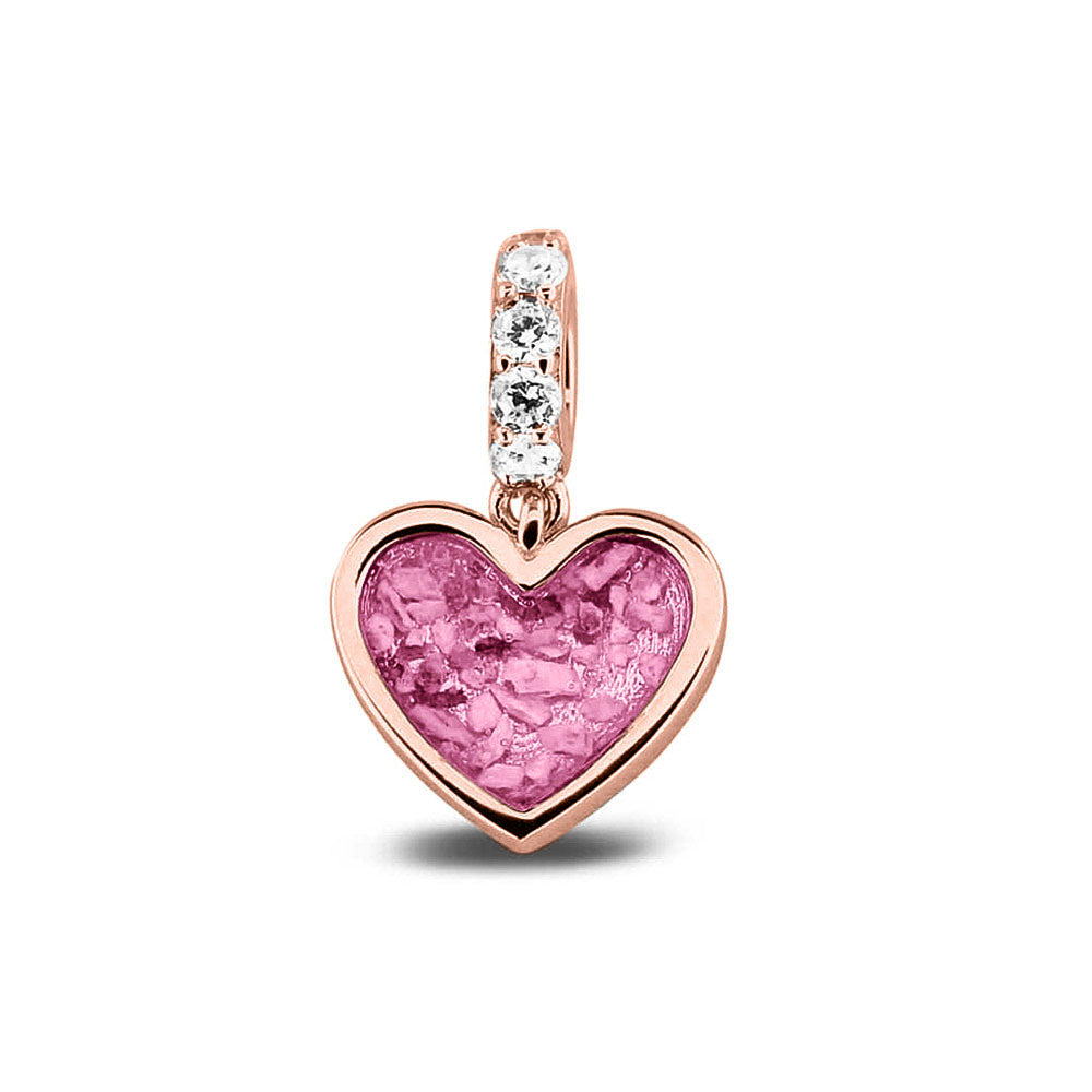 Hartvormige asbedel, het hangoog aan de buitenrand afgewerkt met zirkonia's die aan de voorzijde zichtbaar gevuld wordt met as of haar met een keuze in 20 kleuren. Fluo