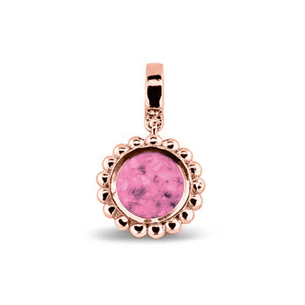 Asbedel die aan de voorzijde zichtbaar gevuld wordt met as of haar. Het vullen en sealen met een keuze in 20 kleuren, wordt in onze ambachtelijke edelsmederij gedaan. Fluo