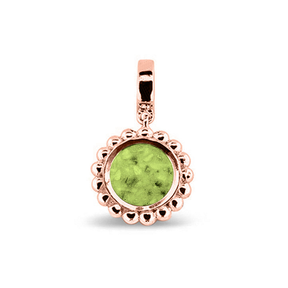 Asbedel die aan de voorzijde zichtbaar gevuld wordt met as of haar. Het vullen en sealen met een keuze in 20 kleuren, wordt in onze ambachtelijke edelsmederij gedaan. Green