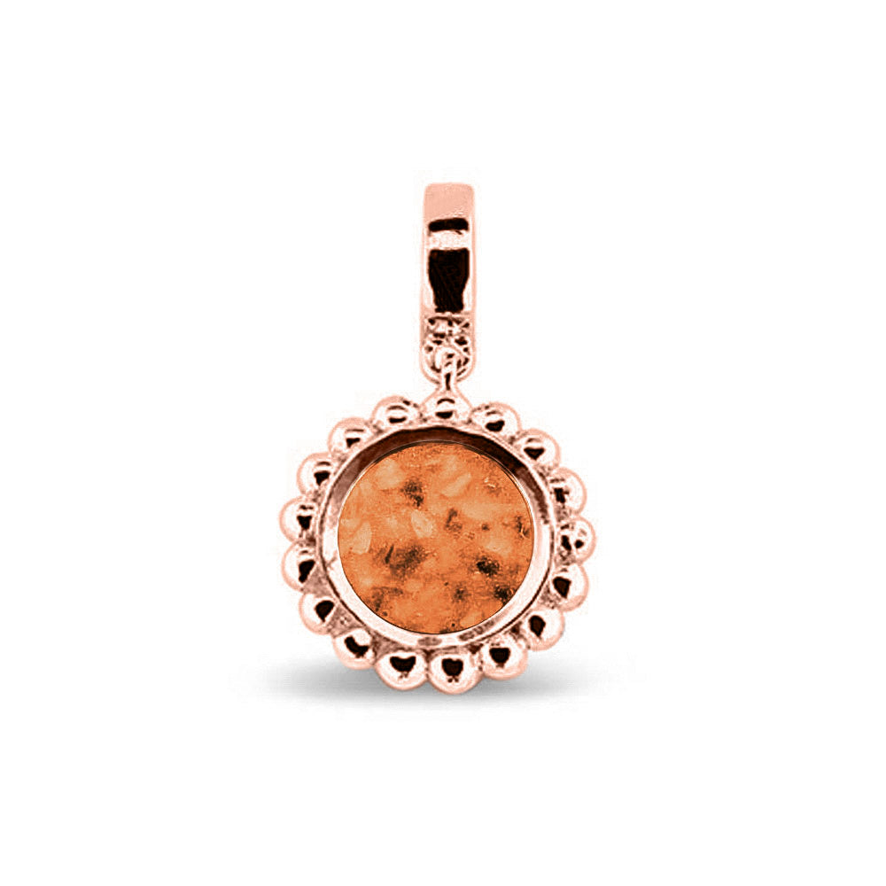 Asbedel die aan de voorzijde zichtbaar gevuld wordt met as of haar. Het vullen en sealen met een keuze in 20 kleuren, wordt in onze ambachtelijke edelsmederij gedaan. Orange