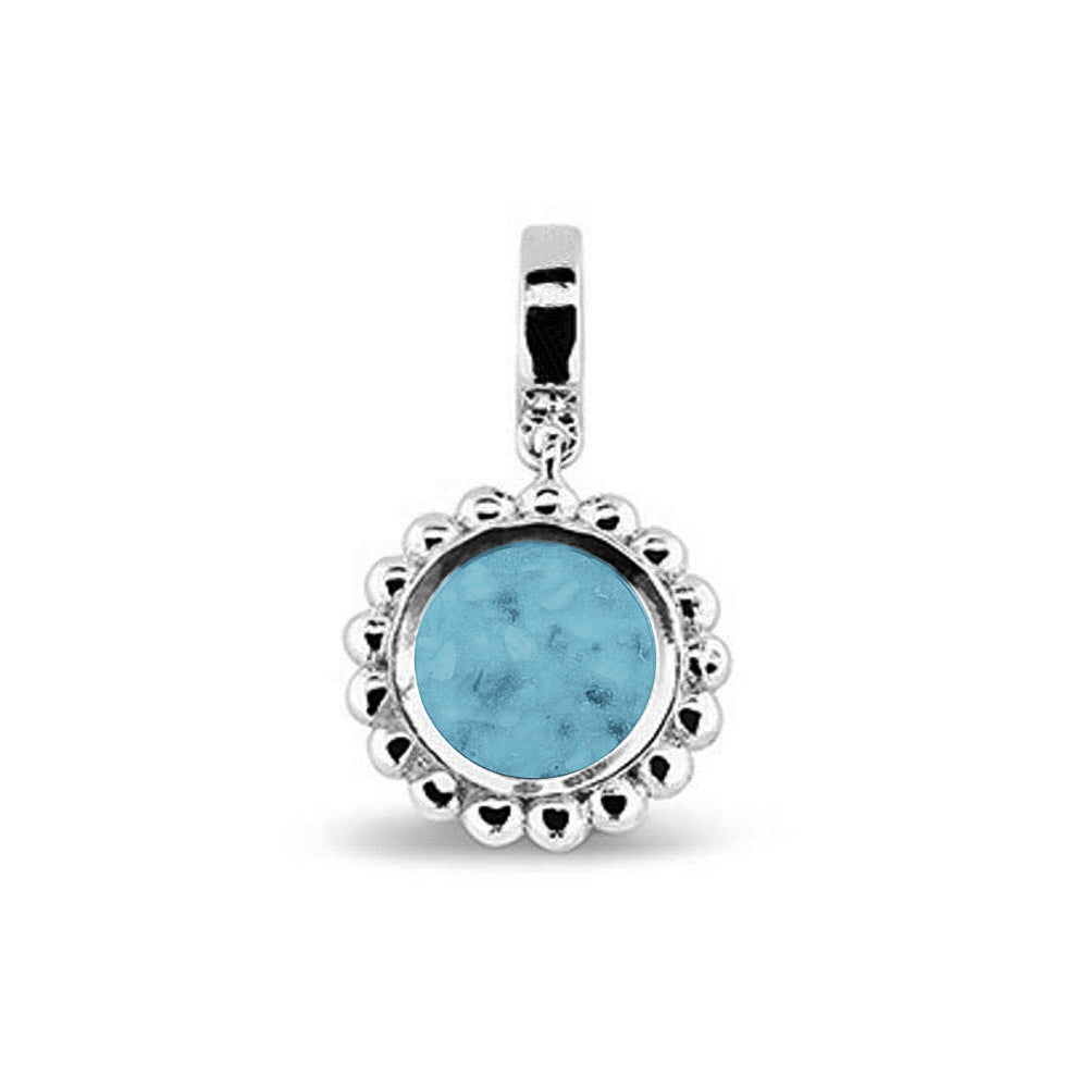 Asbedel aan de voorzijde zichtbaar gevuld wordt met as of haar. Het vullen en sealen met een keuze in 20 kleuren, wordt in onze ambachtelijke edelsmederij gedaan. Baby