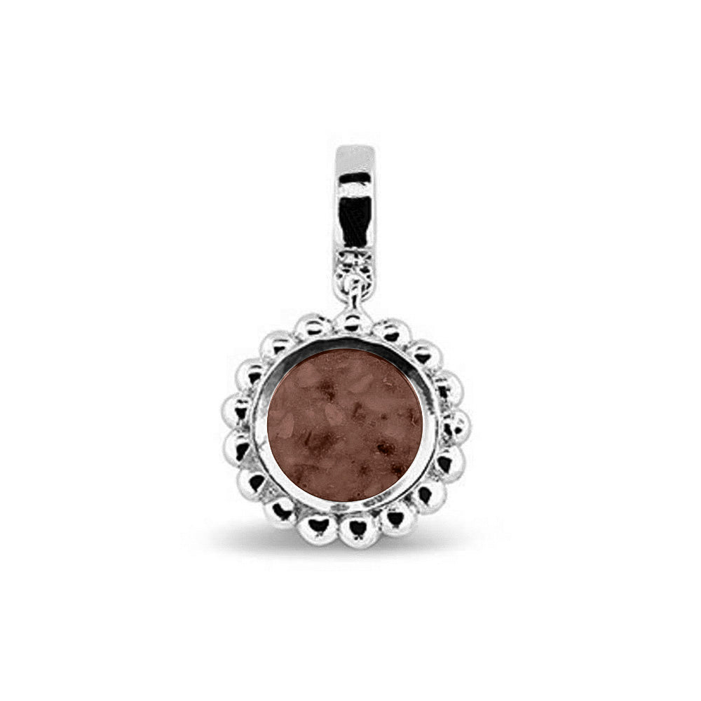 Asbedel die aan de voorzijde zichtbaar gevuld wordt met as of haar. Het vullen en sealen met een keuze in 20 kleuren, wordt in onze ambachtelijke edelsmederij gedaan. Brown