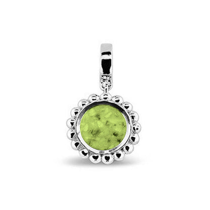 Asbedel die aan de voorzijde zichtbaar gevuld wordt met as of haar. Het vullen en sealen met een keuze in 20 kleuren, wordt in onze ambachtelijke edelsmederij gedaan. Green
