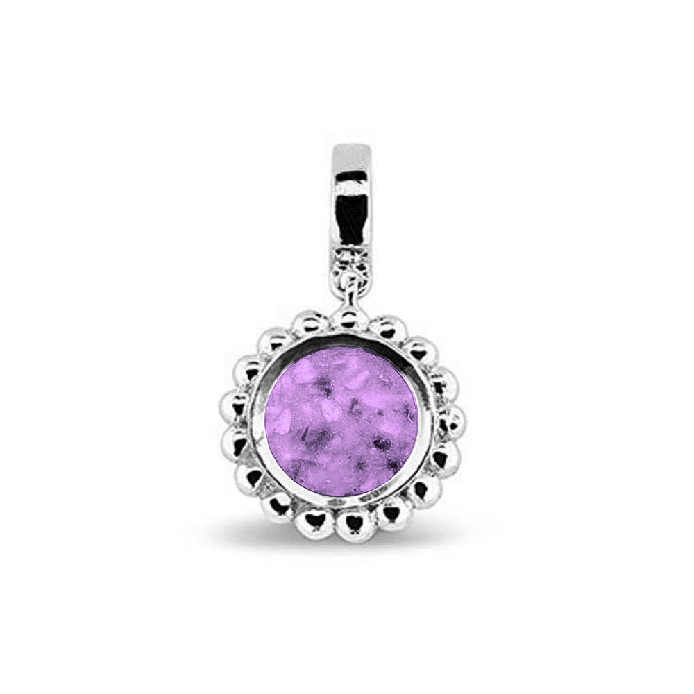 Asbedel die aan de voorzijde zichtbaar gevuld wordt met as of haar. Het vullen en sealen met een keuze in 20 kleuren, wordt in onze ambachtelijke edelsmederij gedaan. Purple