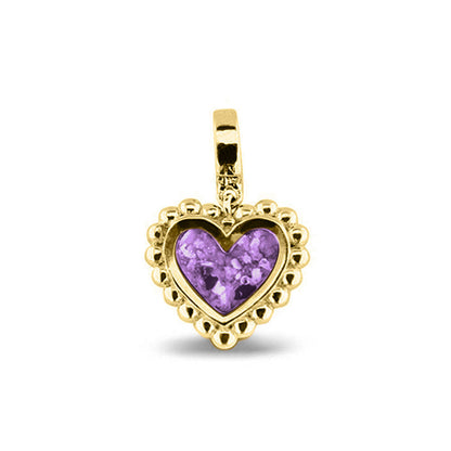 Hartvormige asbedel, die aan de voorzijde zichtbaar gevuld wordt met as of haar. Het vullen en sealen met een keuze in 20 kleuren, wordt in onze ambachtelijke edelsmederij gedaan. Purple