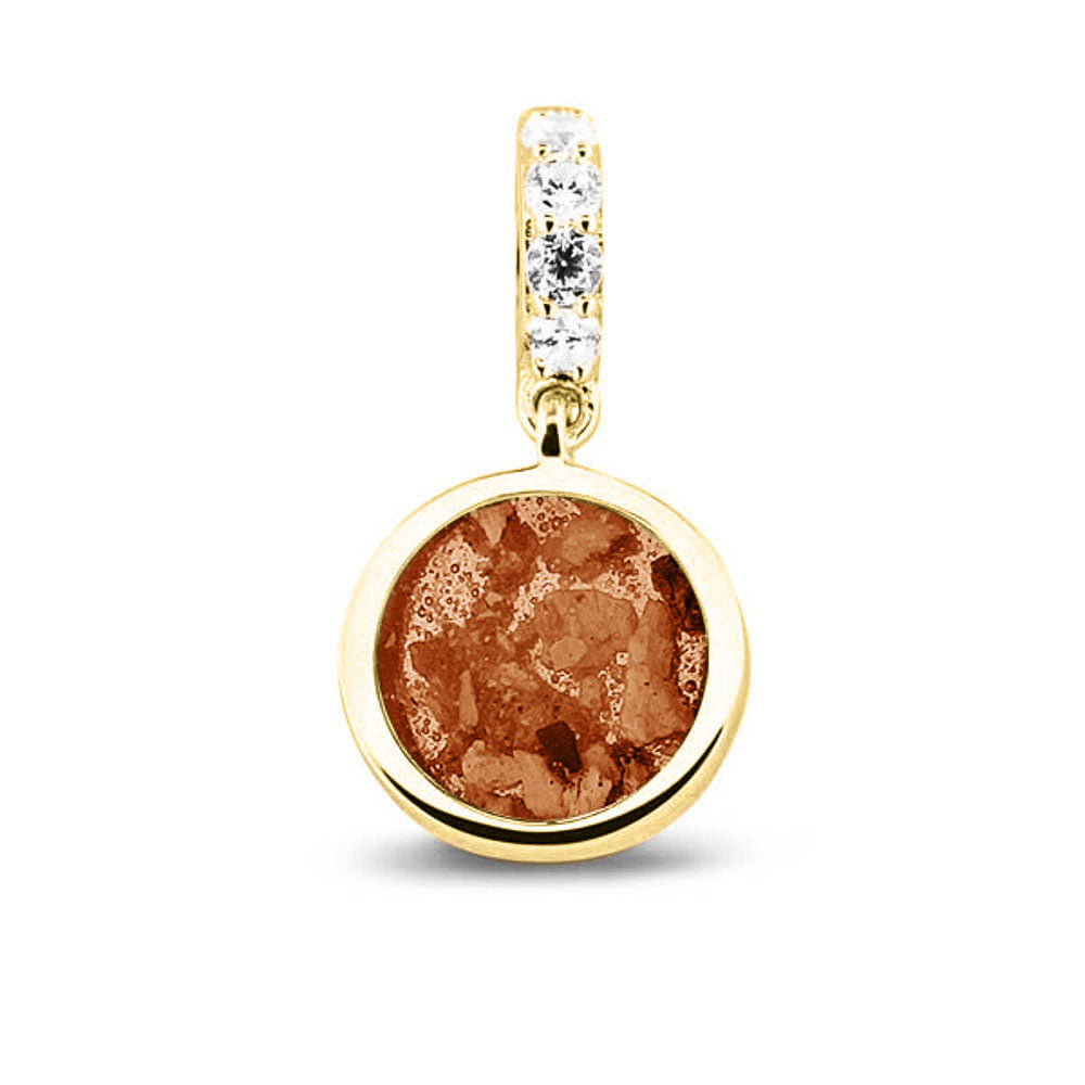 Asbedel rond subtiel design , het hangoog aan de buitenrand afgewerkt met zirkonia's, die aan de voorzijde zichtbaar gevuld wordt met as of haar met een keuze in 20 kleuren. Orange