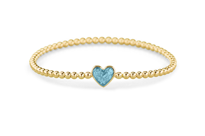 Flexibele as armband met hart als compartiment voor as of haar, gedenksieraden. Baby