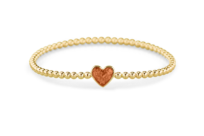 Flexibele as armband met hart als compartiment voor as of haar, gedenksieraden. Orange