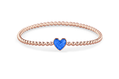 Flexibele as armband met hart als compartiment voor as of haar, gedenksieraden. Blue