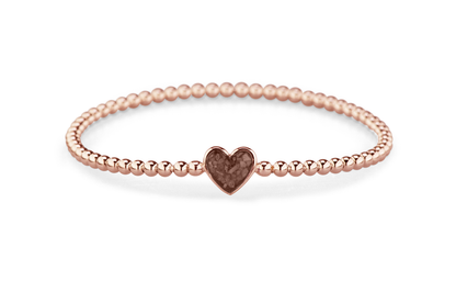 Flexibele as armband met hart als compartiment voor as of haar, gedenksieraden. Brown
