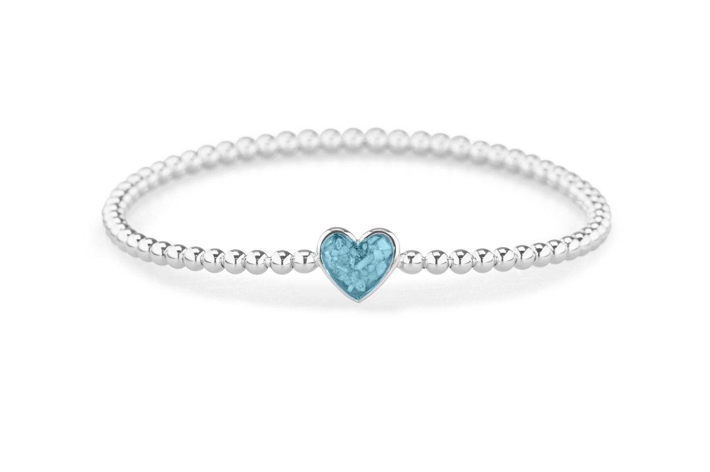 Flexibele as armband met hart als compartiment voor as of haar, gedenksieraden. Baby