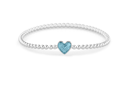 Flexibele as armband met hart als compartiment voor as of haar, gedenksieraden. Baby